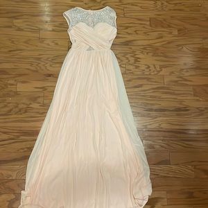 Beautiful long dress size junior 7/8. Sheer back and front.